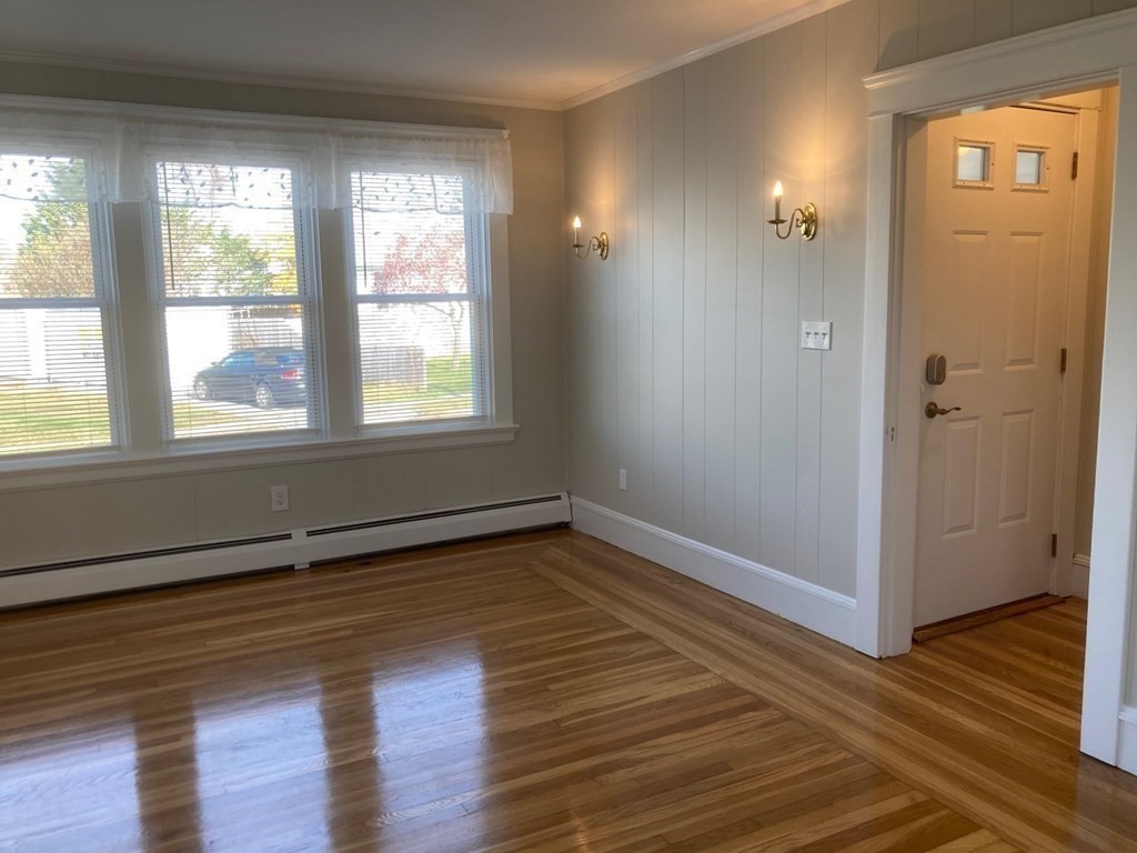 33 Circuit Drive Riverside, RI 02915 - Photo 10 of 34 an empty room with wooden floor and windows