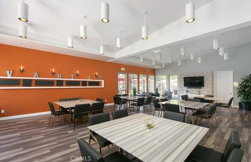 24 Colonial Way Aliso Viejo, CA 92656 - Photo 17 of 27 a view of a dining room with furniture window and wooden floor