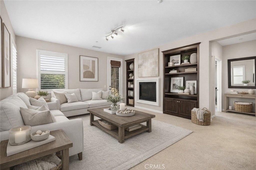 24 Colonial Way Aliso Viejo, CA 92656 - Photo 2 of 27 a living room with furniture and a large window
