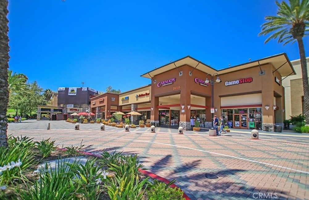 24 Colonial Way Aliso Viejo, CA 92656 - Photo 25 of 27 a group of cars parked in front of building