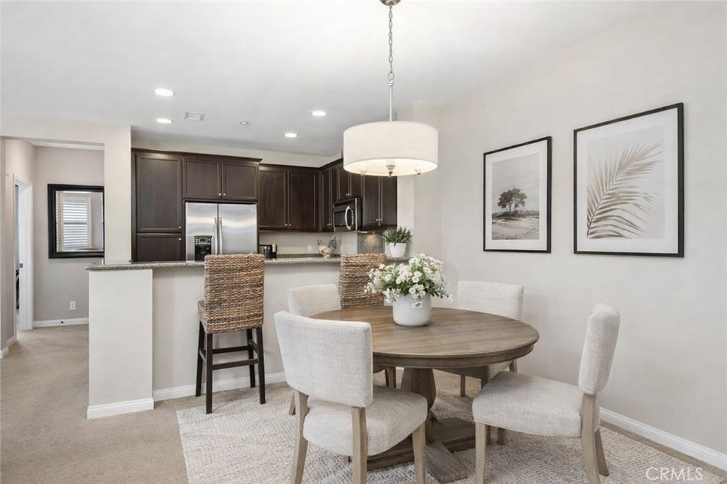 24 Colonial Way Aliso Viejo, CA 92656 - Photo 3 of 27 a view of a dining room with furniture