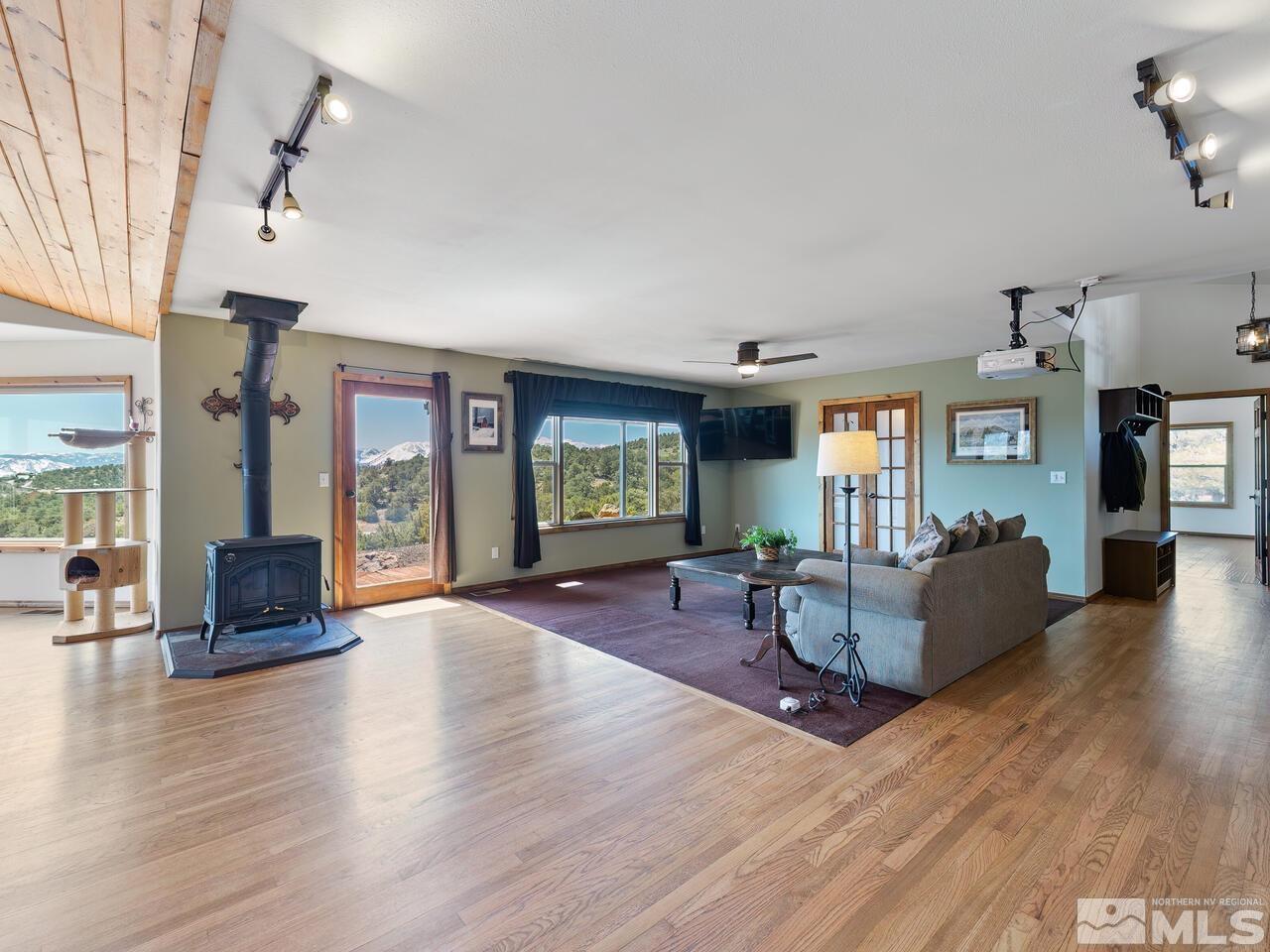 700 Saddleback Road Reno, NV 89521 - Photo 17 of 38 a living room with furniture and wooden floor
