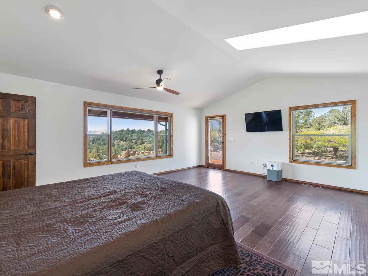 700 Saddleback Road Reno, NV 89521 - Photo 20 of 38 a view of a bedroom with furniture and window
