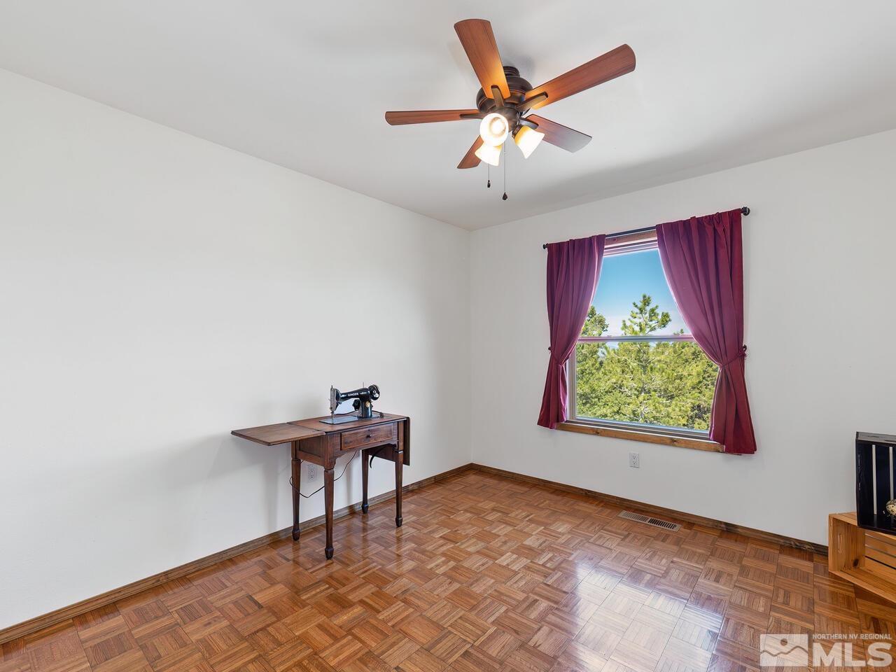 700 Saddleback Road Reno, NV 89521 - Photo 28 of 38 a workspace with furniture and window