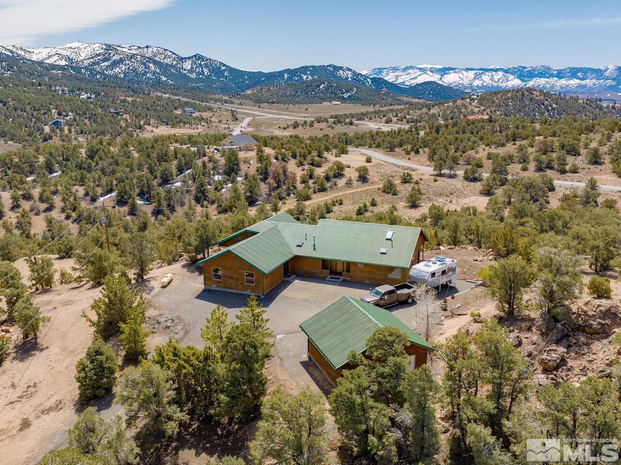 700 Saddleback Road Reno, NV 89521 - Photo 3 of 38 an aerial view of residential house with parking space
