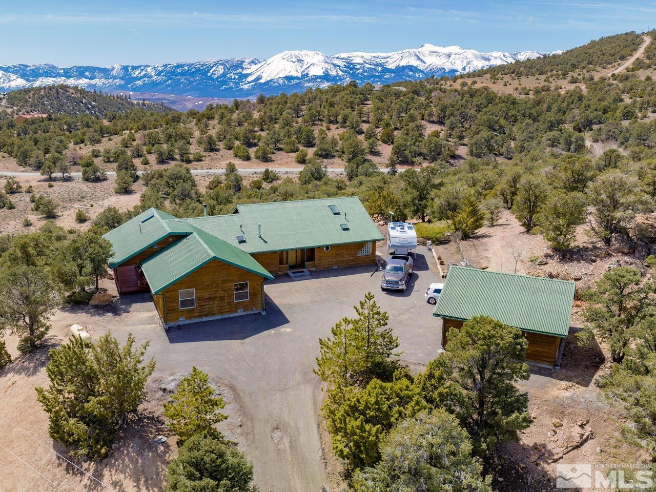700 Saddleback Road Reno, NV 89521 - Photo 34 of 38 an aerial view of a house with a yard
