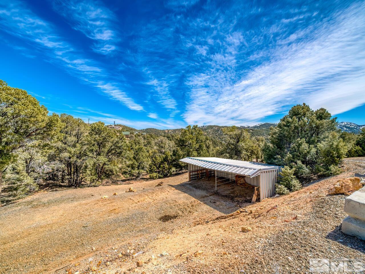 700 Saddleback Road Reno, NV 89521 - Photo 38 of 38 a view of a backyard with wooden fence
