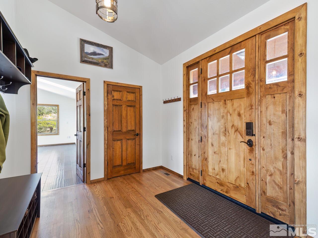 700 Saddleback Road Reno, NV 89521 - Photo 7 of 38 a view of front door with wooden floor