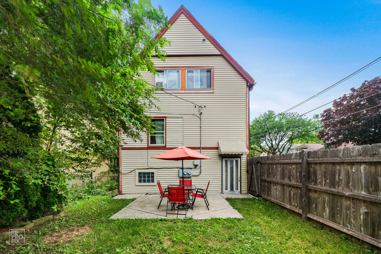 3101 Grove Avenue Berwyn, IL 60402 - Photo 14 of 14 a view of backyard with table and chairs and potted plants