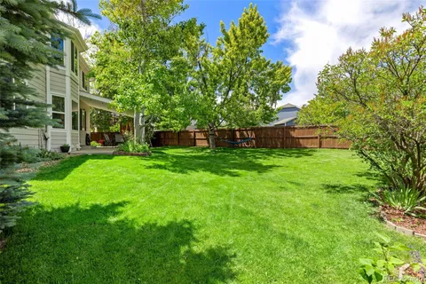 a view of a backyard with a garden