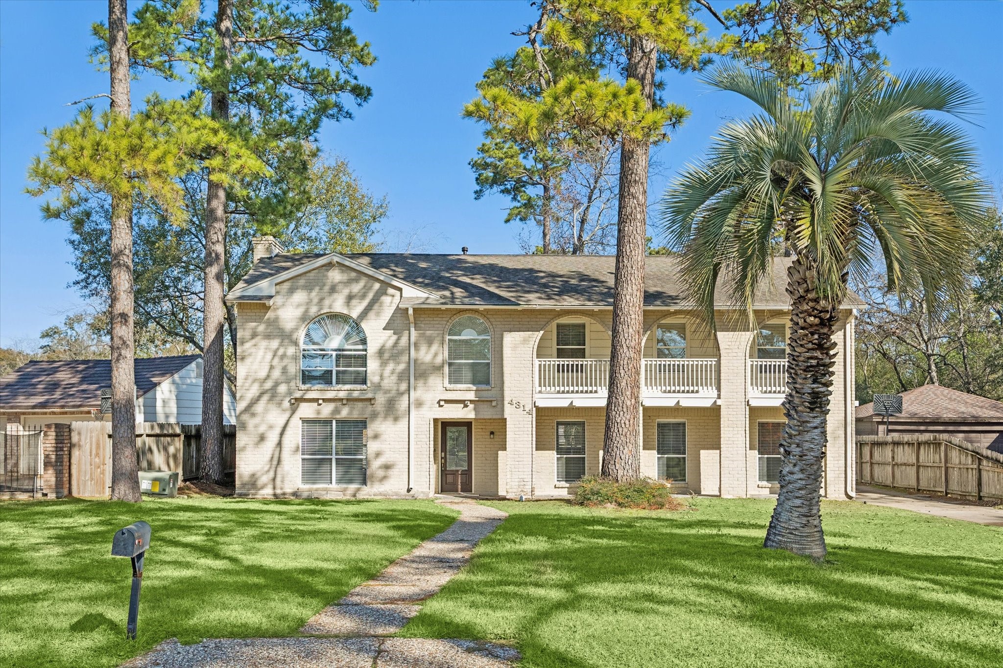 front view of a building with a yard