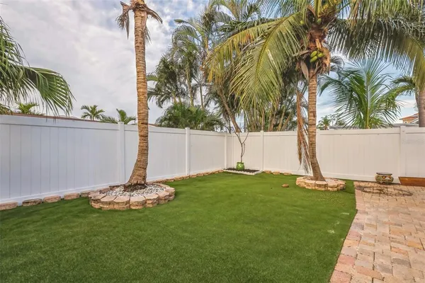 a view of a garden with a tree