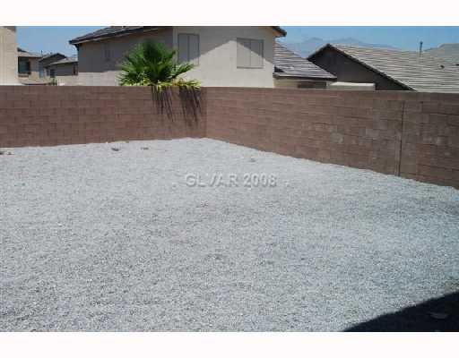 9128 Rusty Rifle Avenue Las Vegas, NV 89143 - Photo 8 of 8 Yard/Garden.