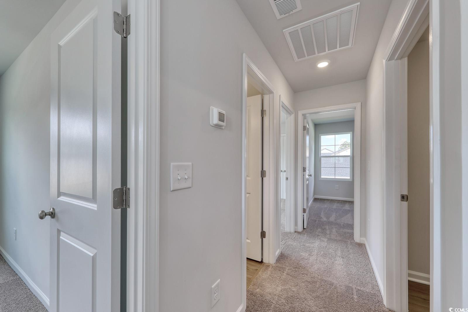 3416 Logan Street Conway, SC 29526 - Photo 21 of 30 Hallway featuring light colored carpet and recessed lighting