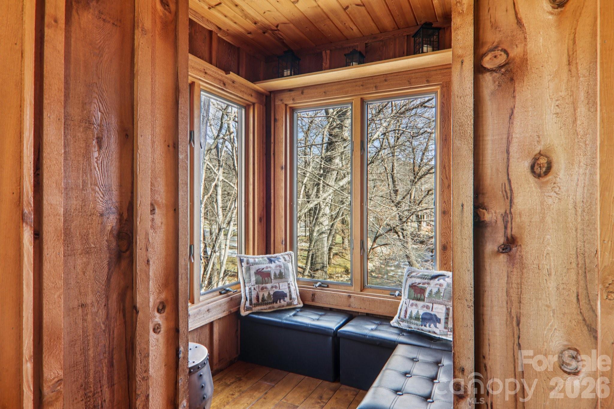 129 Riverside Villa Drive Maggie Valley, NC 28751 - Photo 21 of 43 a living room with furniture and a window