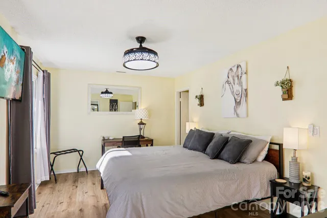a kitchen with a sink a stove and a refrigerator