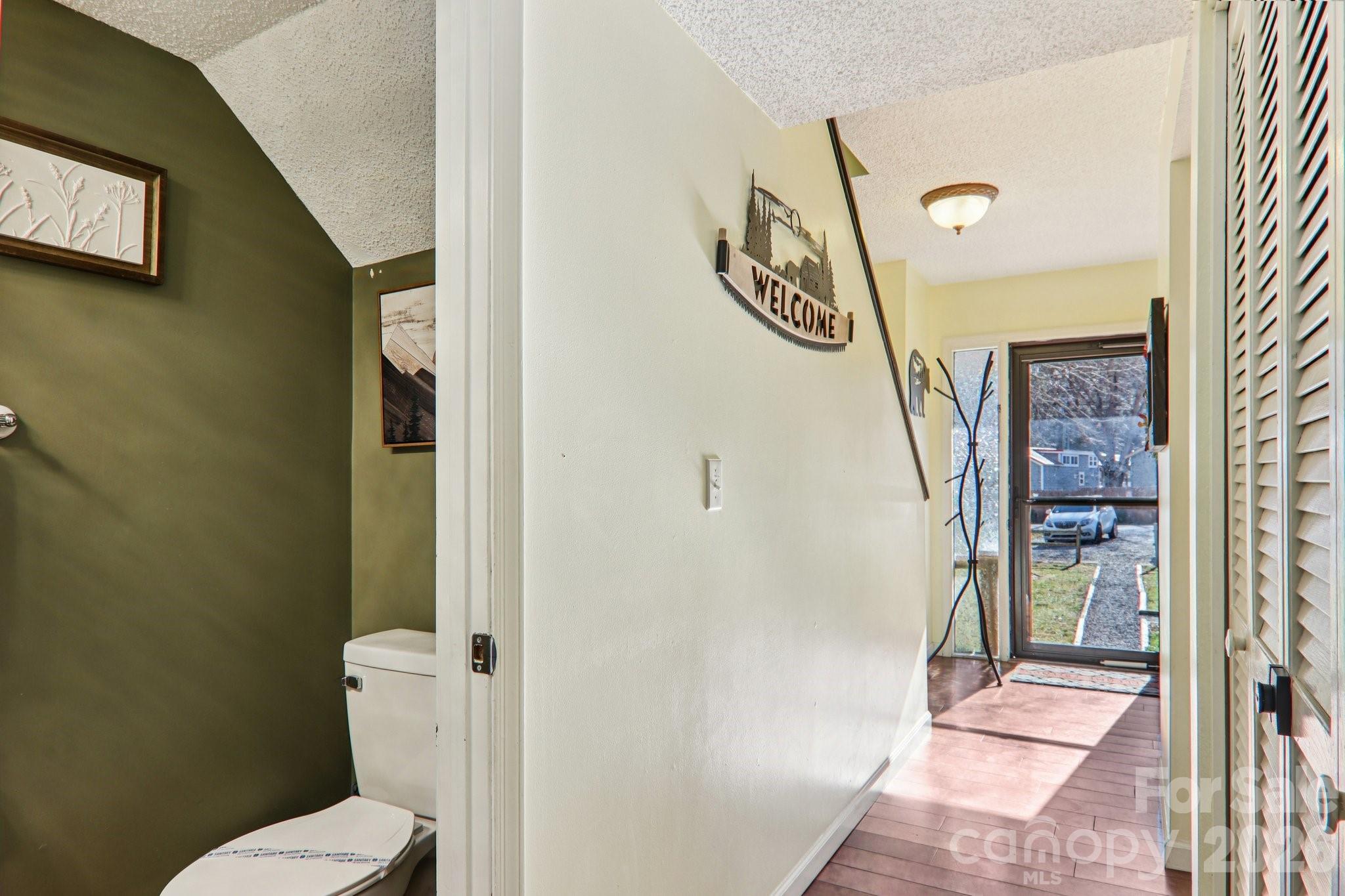 129 Riverside Villa Drive Maggie Valley, NC 28751 - Photo 34 of 43 a bathroom with a toilet and a shower