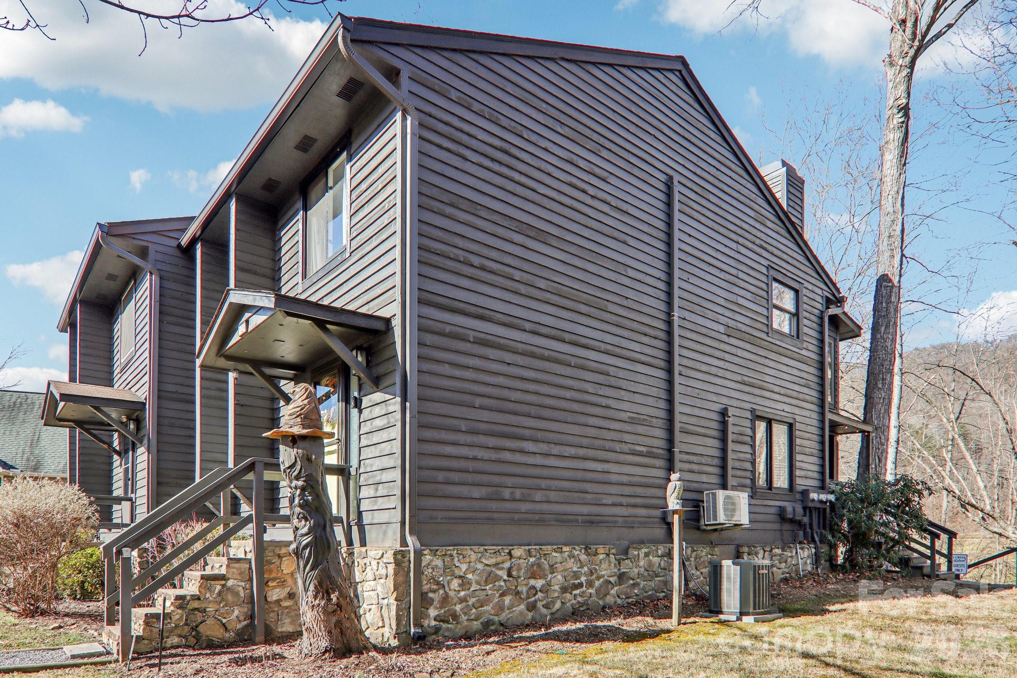 129 Riverside Villa Drive Maggie Valley, NC 28751 - Photo 4 of 43 a view of street along with house