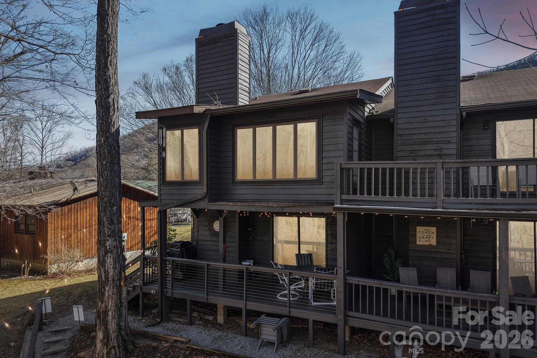 129 Riverside Villa Drive Maggie Valley, NC 28751 - Photo 42 of 43 a front view of a house with a balcony