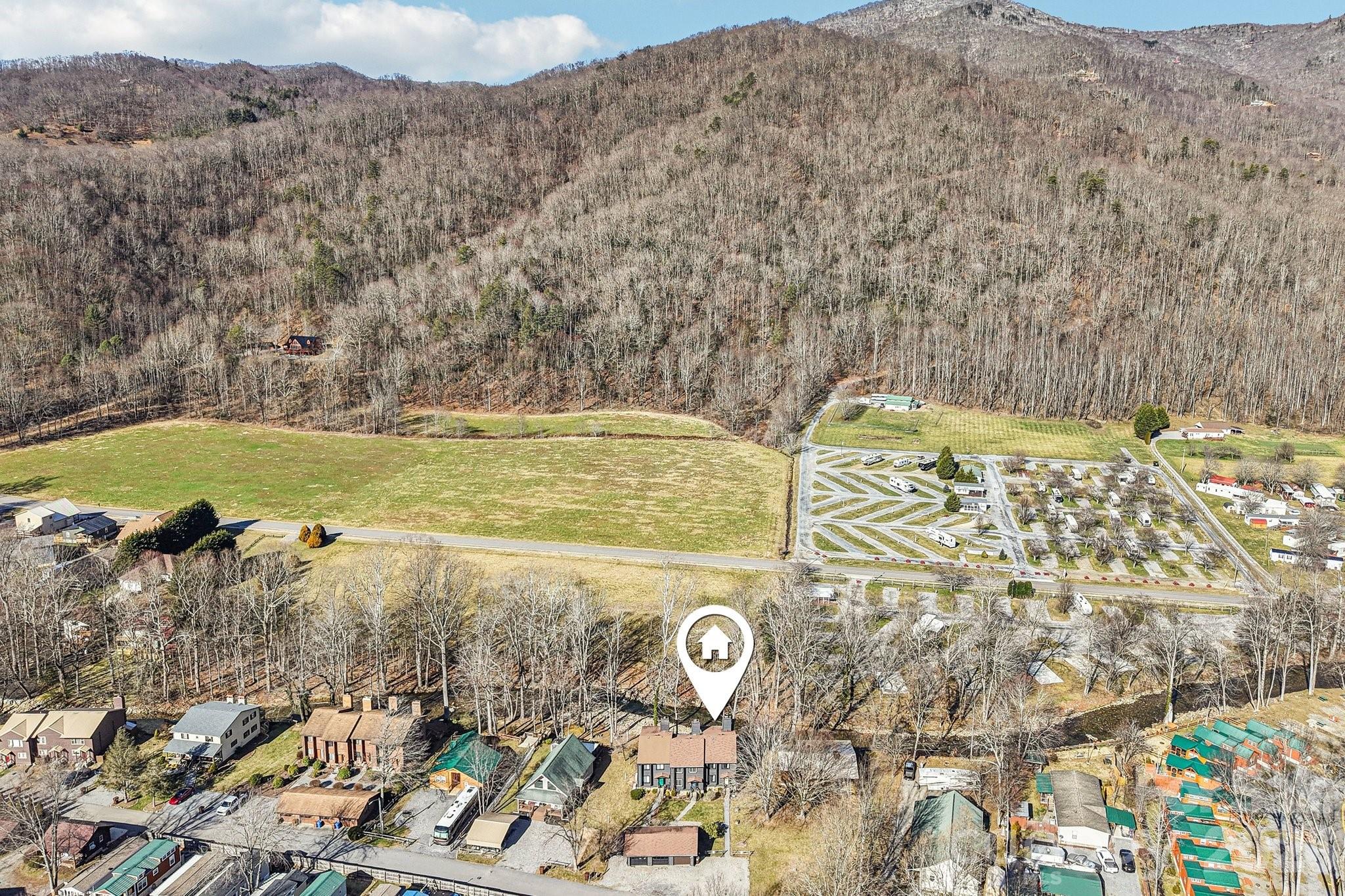 129 Riverside Villa Drive Maggie Valley, NC 28751 - Photo 43 of 43 a view of a swimming pool with a yard