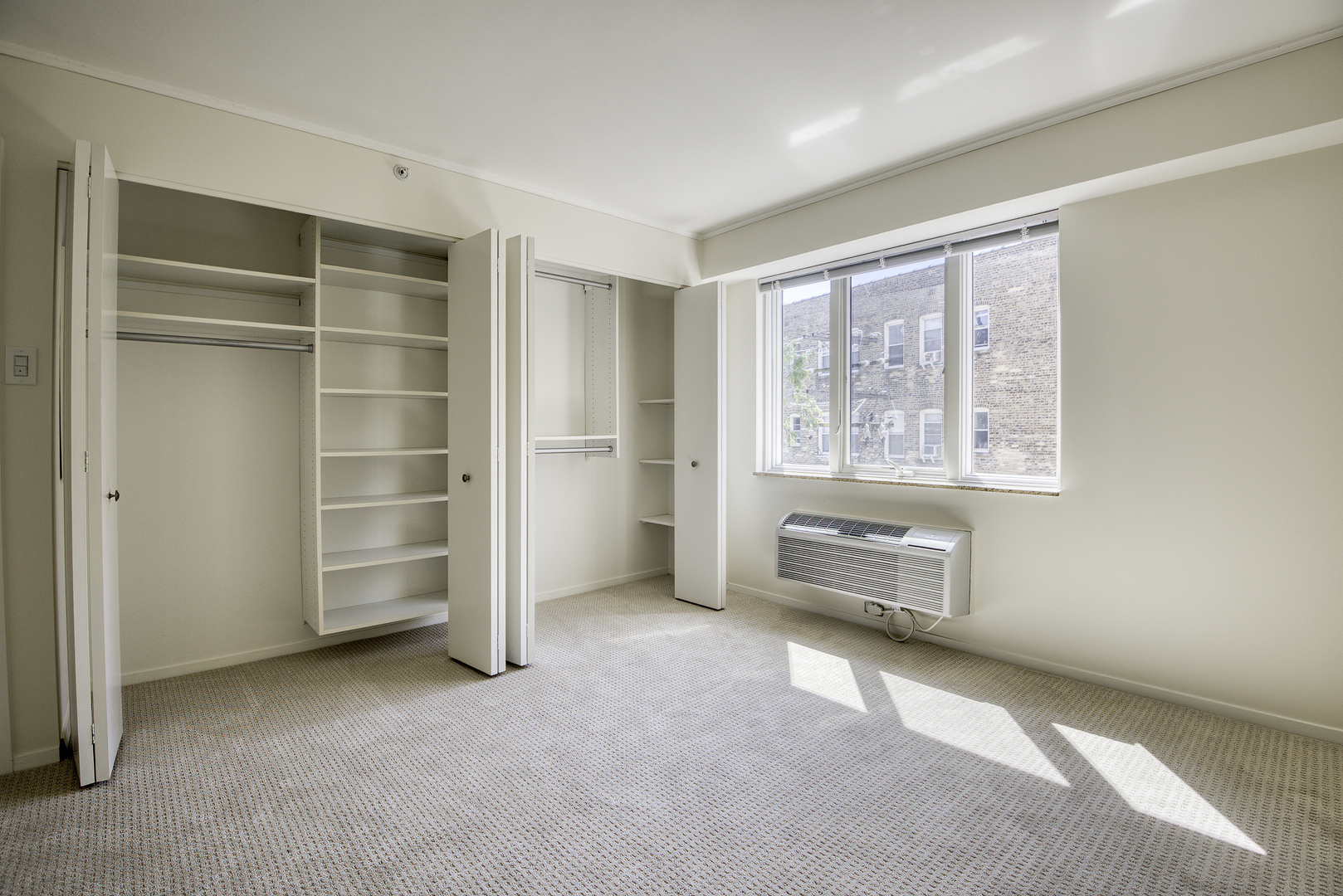 1020 Grove Street, Unit 301 Evanston, IL 60201 - Photo 11 of 23 a view of an empty room with a window