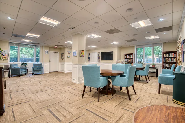 a view of a dining room with furniture