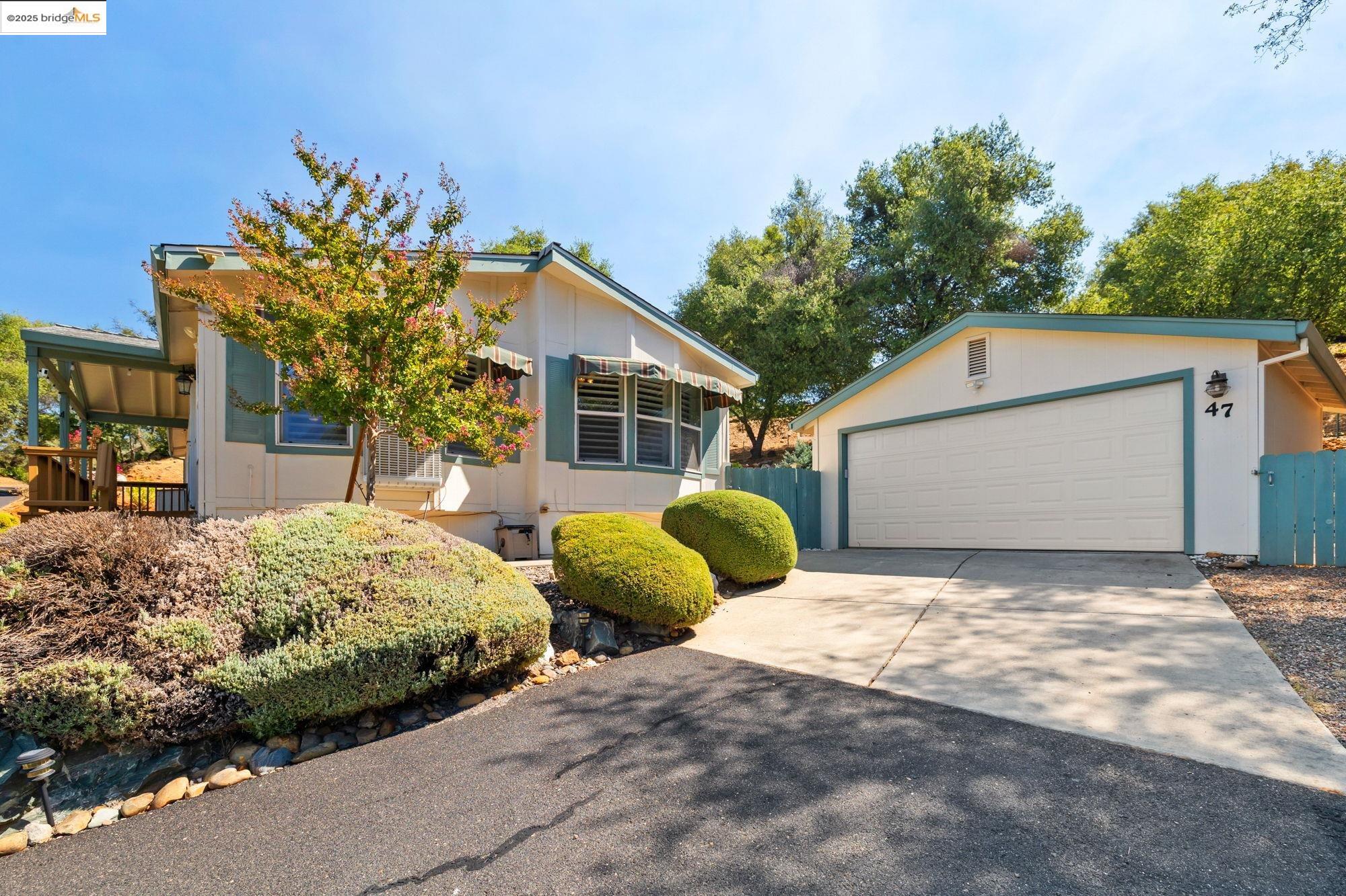 23732 Parrotts Ferry Road, Unit SPC 47 Columbia, CA 95310 - Photo 2 of 31 a view of backyard of the house