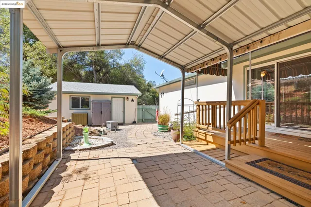 a view of empty room with furniture