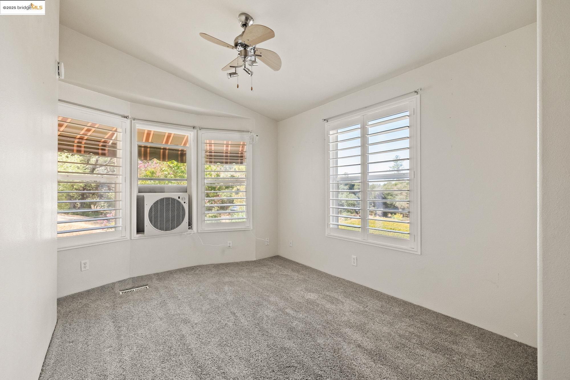 23732 Parrotts Ferry Road, Unit SPC 47 Columbia, CA 95310 - Photo 5 of 31 a view of an empty room with a window