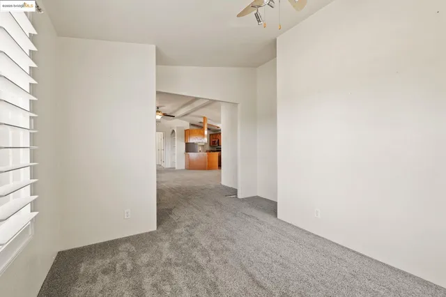 a view of a room that has a washer and dryer in it