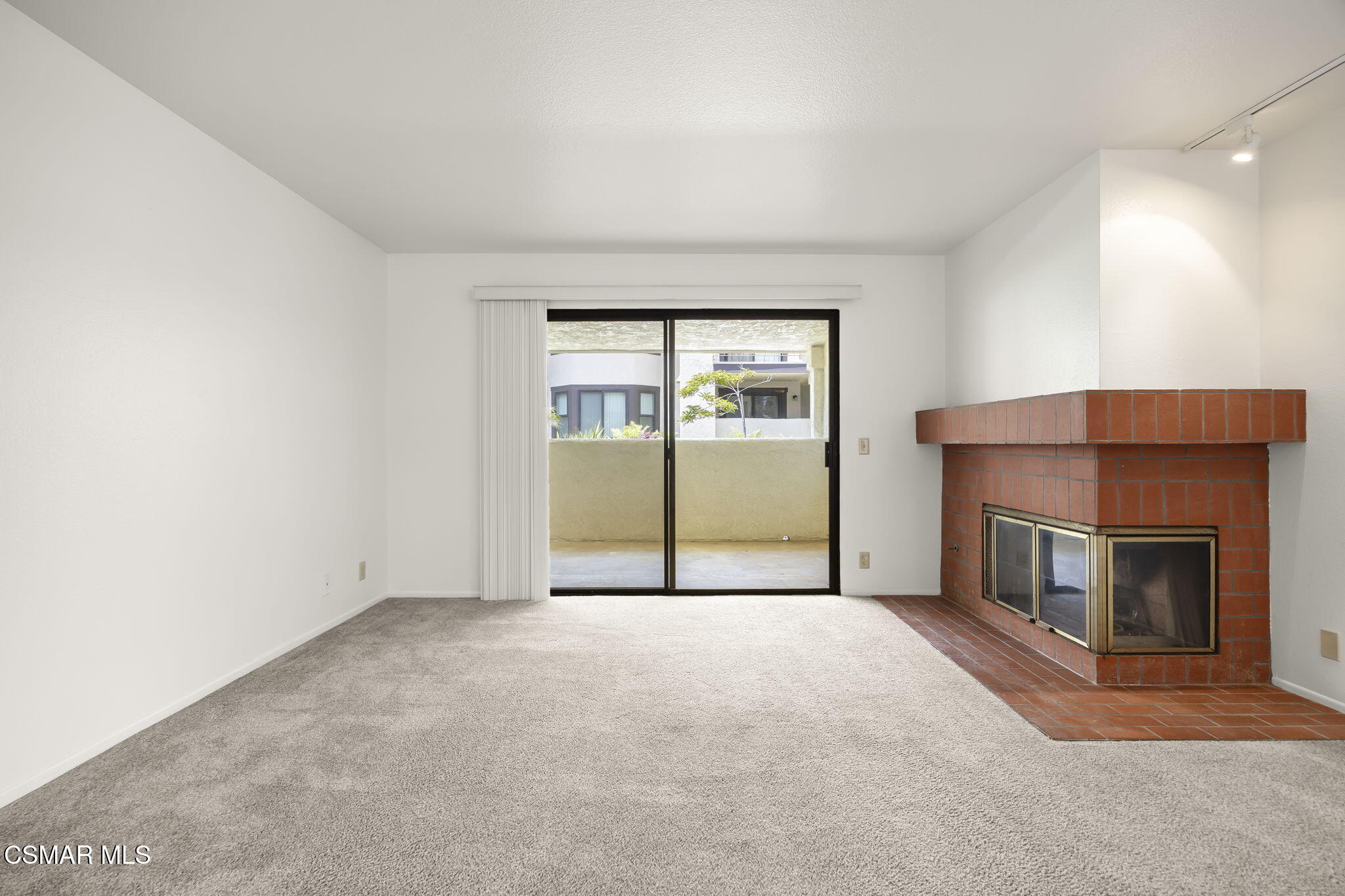 1923 Majorca Drive Oxnard, CA 93035 - Photo 3 of 34 an empty room with windows and fireplace