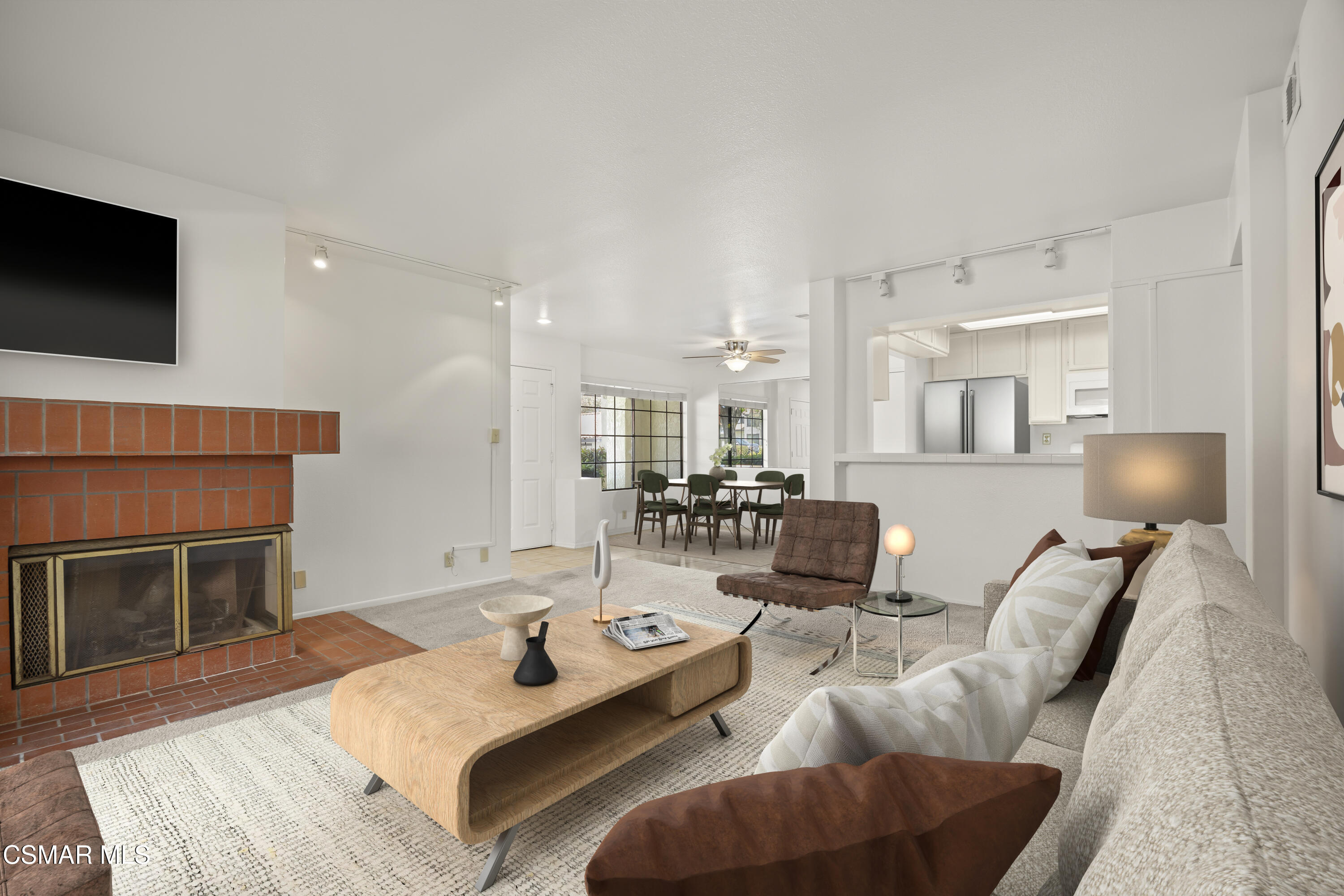 1923 Majorca Drive Oxnard, CA 93035 - Photo 4 of 34 a living room with furniture a flat screen tv and a fireplace