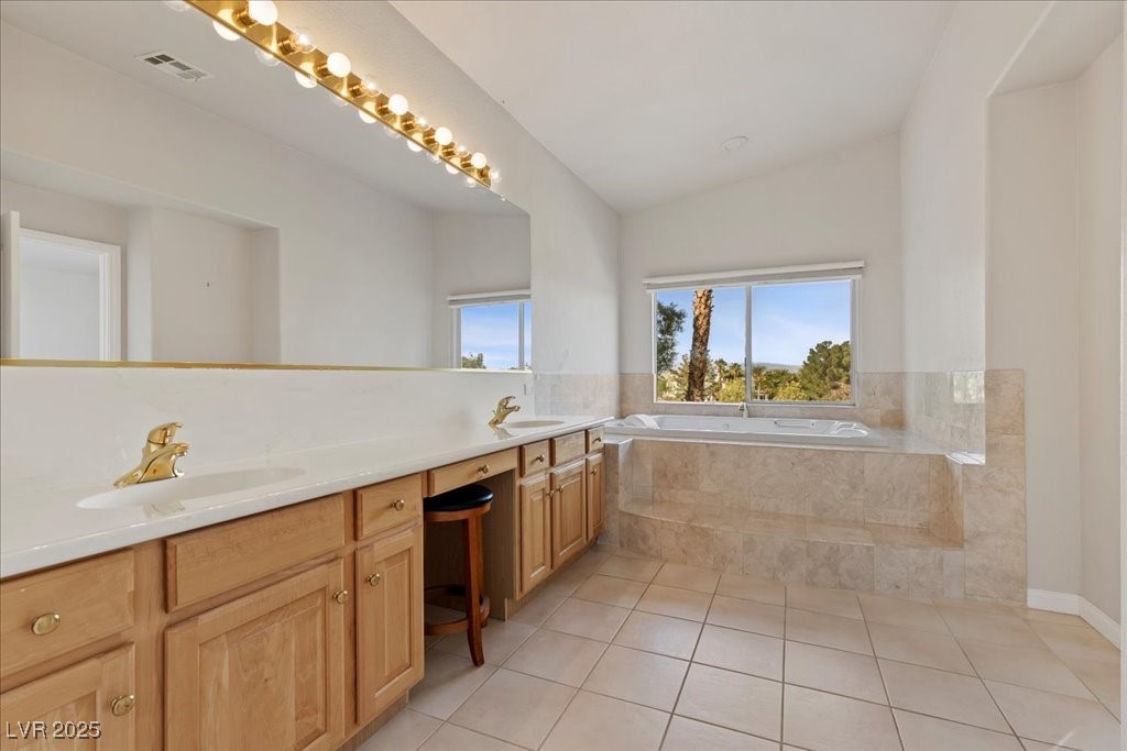 1906 Grey Eagle Street Henderson, NV 89074 - Photo 50 of 95 Golf Course view from the primary bathroom with Rolladen Rolling Shutters