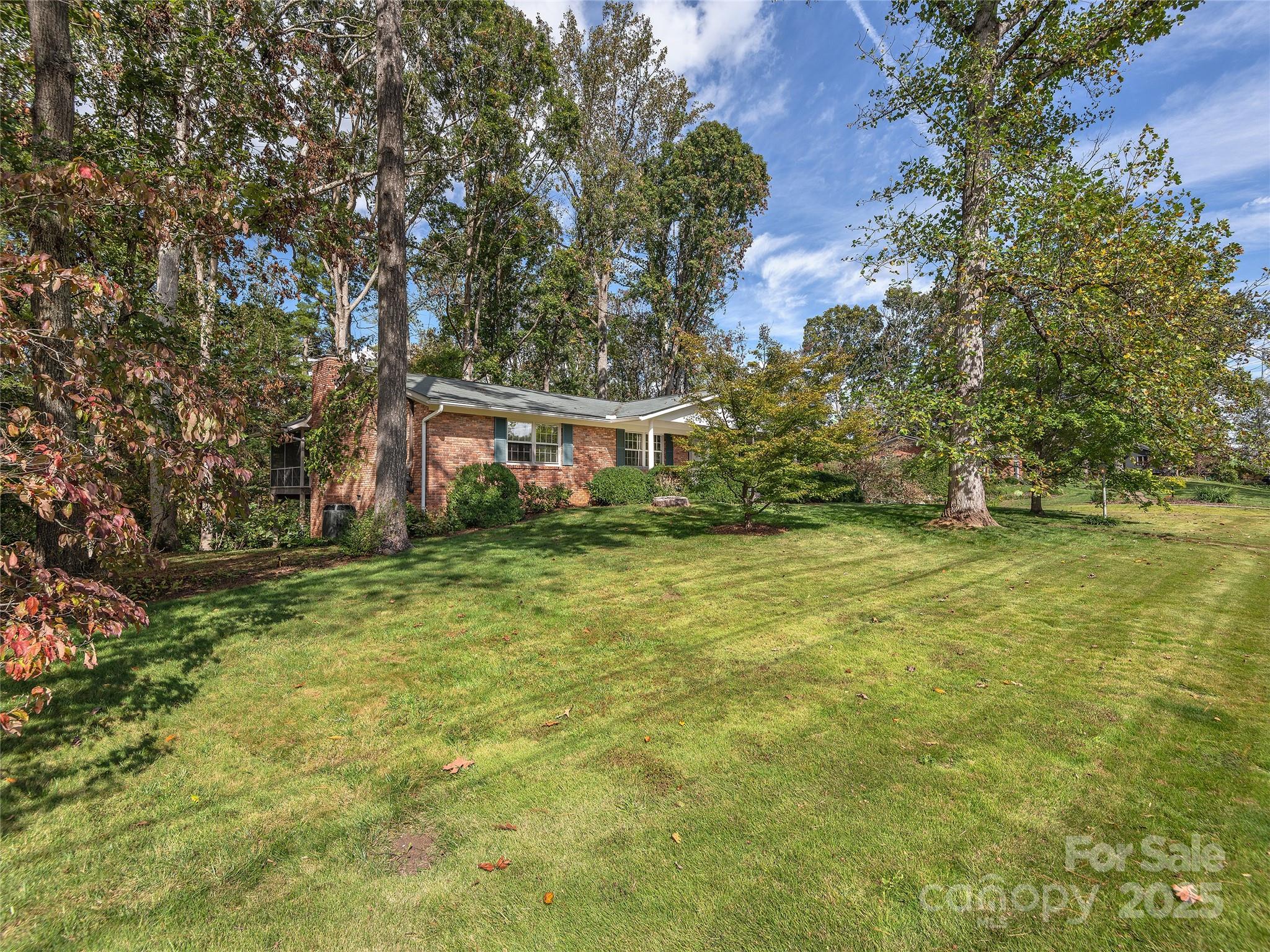 7 East Fox Chase Road Asheville, NC 28804 - Photo 3 of 30 a view of a house with a yard