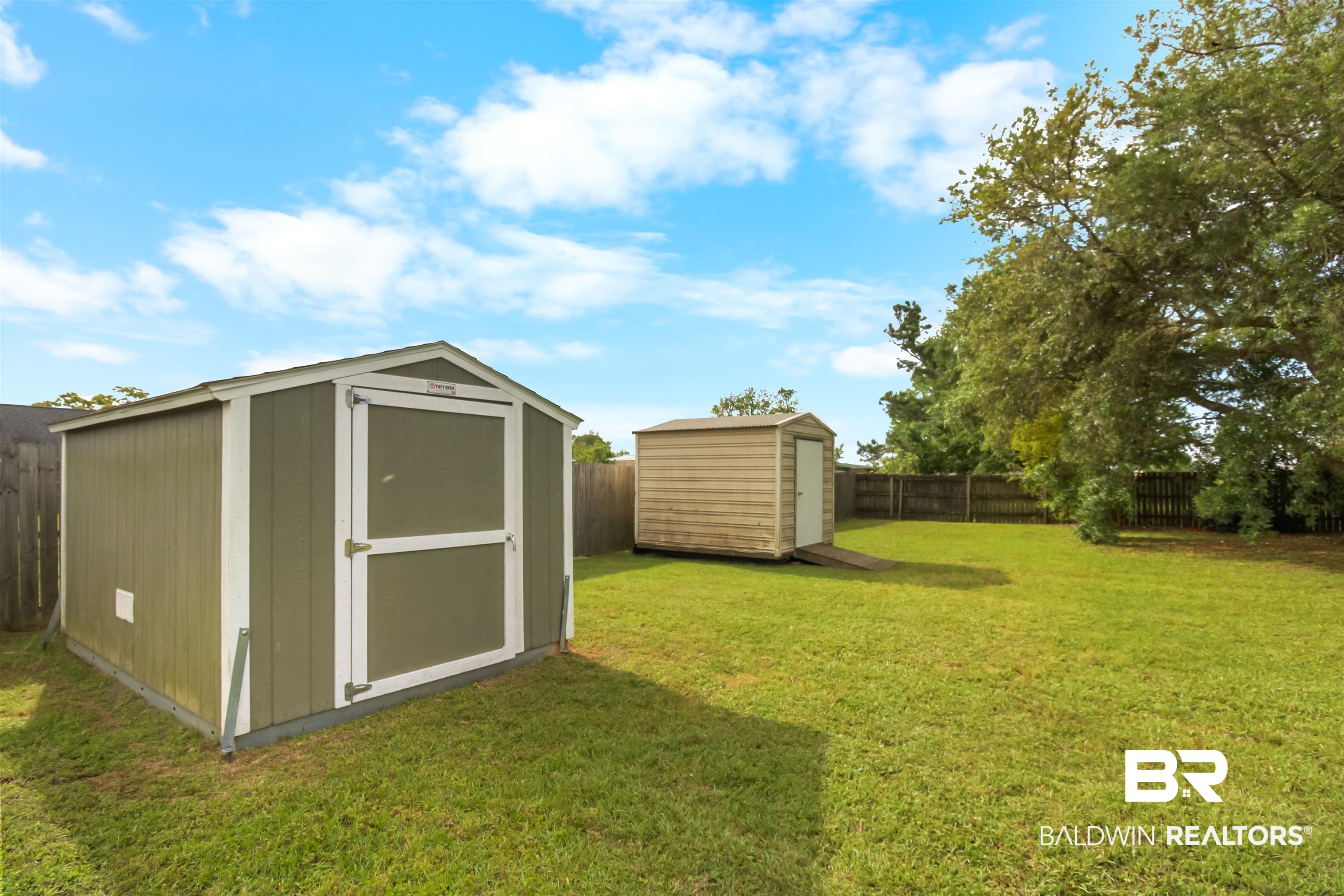 8940 Caitlin Street Foley, AL 36535 - Photo 26 of 27 View of shed featuring a fenced backyard