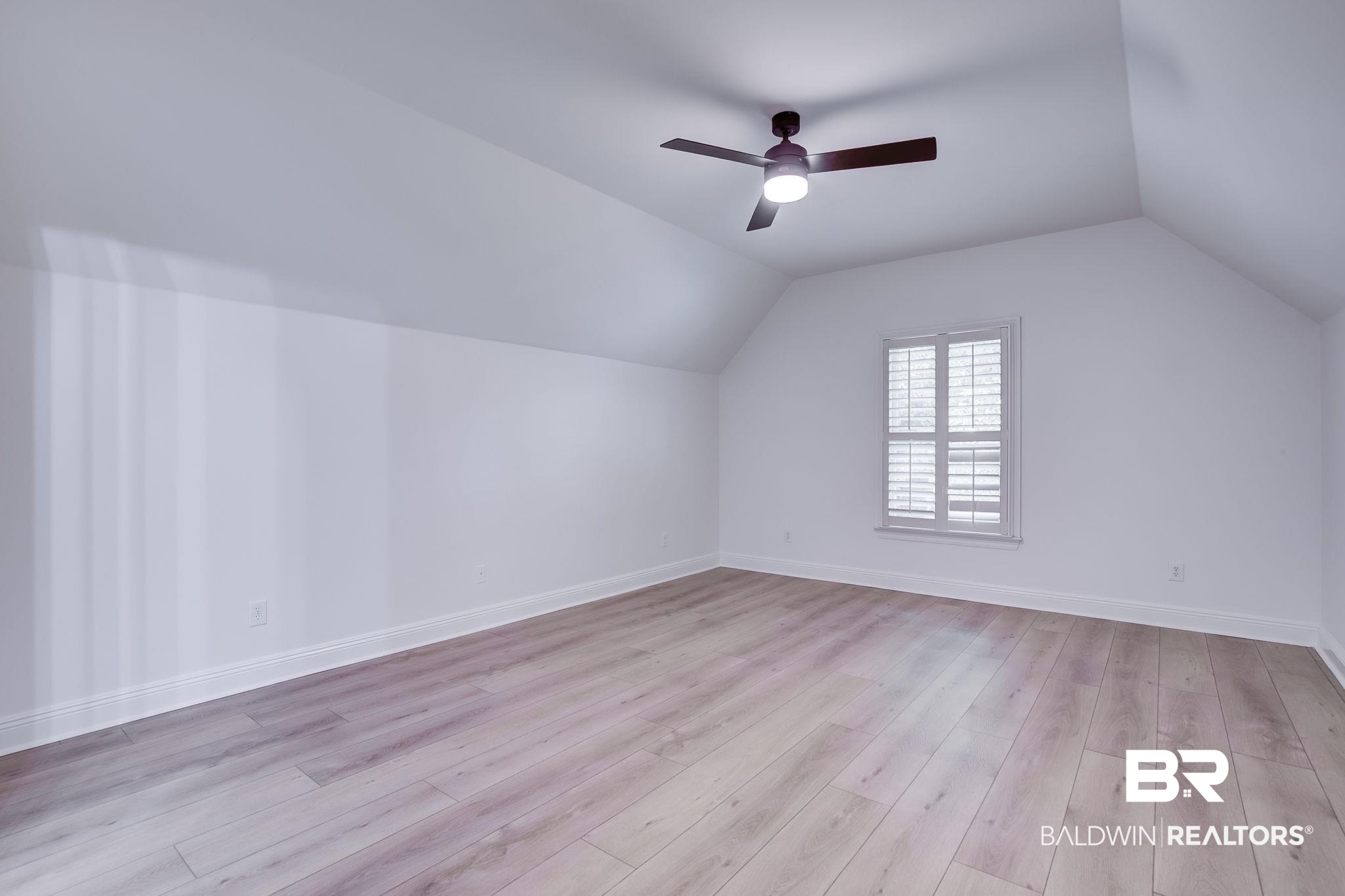 105 High Pines Ridge Fairhope, AL 36532 - Photo 72 of 97 Additional living space featuring lofted ceiling, light wood-style floors, ceiling fan, and baseboards