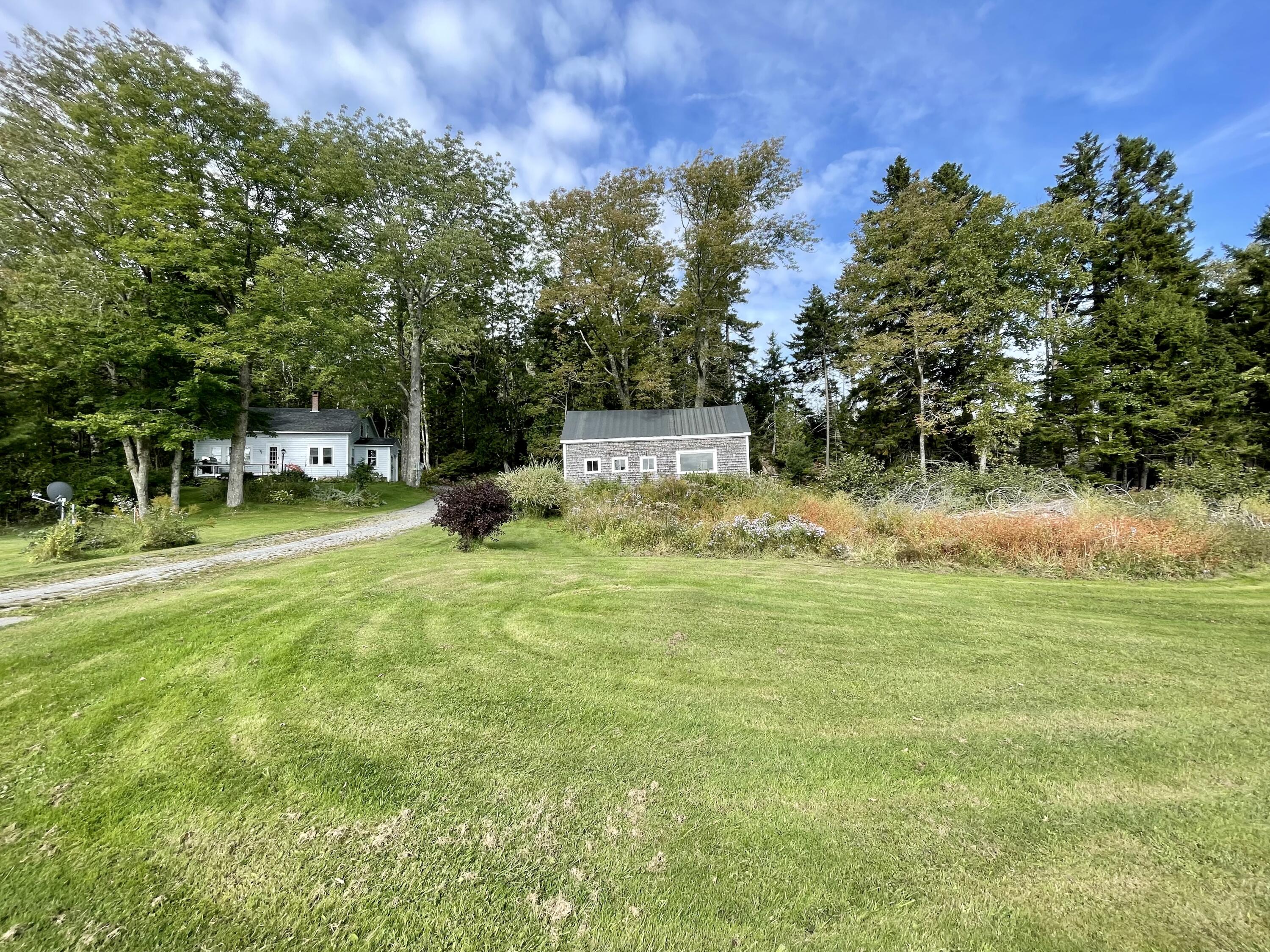 141 Weir Cove Road Harborside, ME 04642 - Photo 1 of 23 88E207C7-A8D6-4CE5-ACA8-0D36A001520A