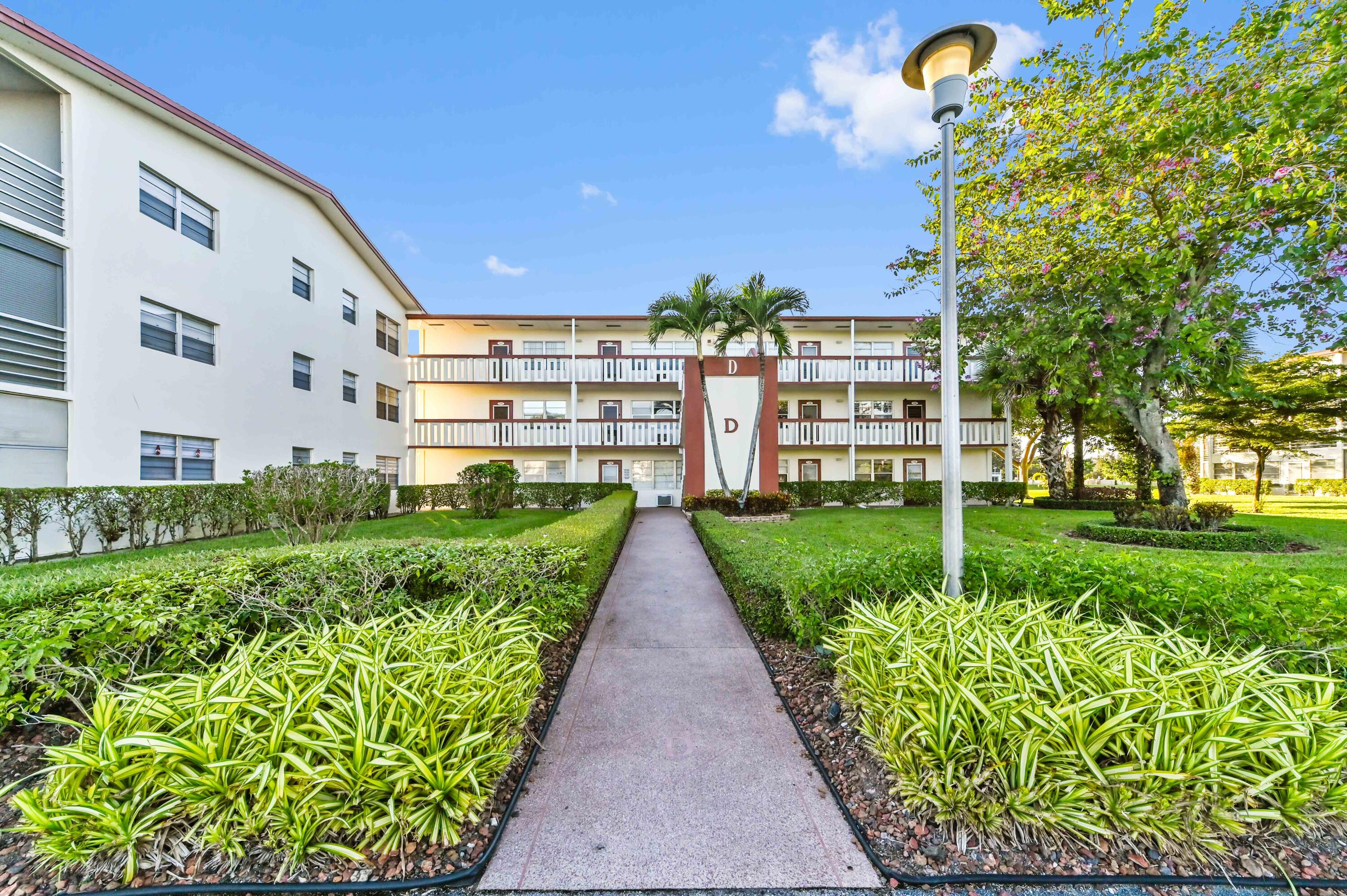 135 Brighton Drive, Unit D Boca Raton, FL 33434 - Photo 1 of 25 02 front 02