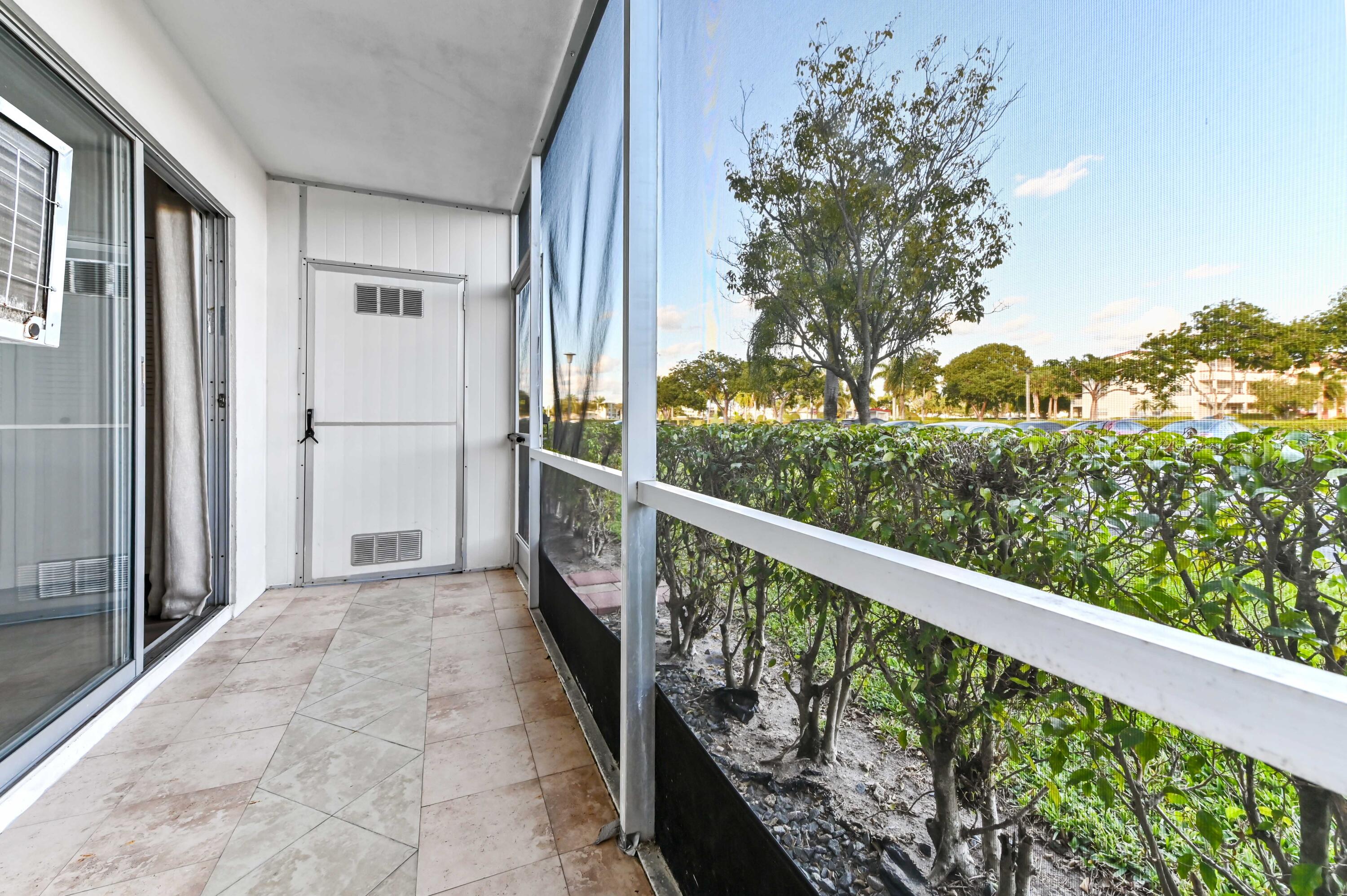 135 Brighton Drive, Unit D Boca Raton, FL 33434 - Photo 17 of 25 19 porch 02