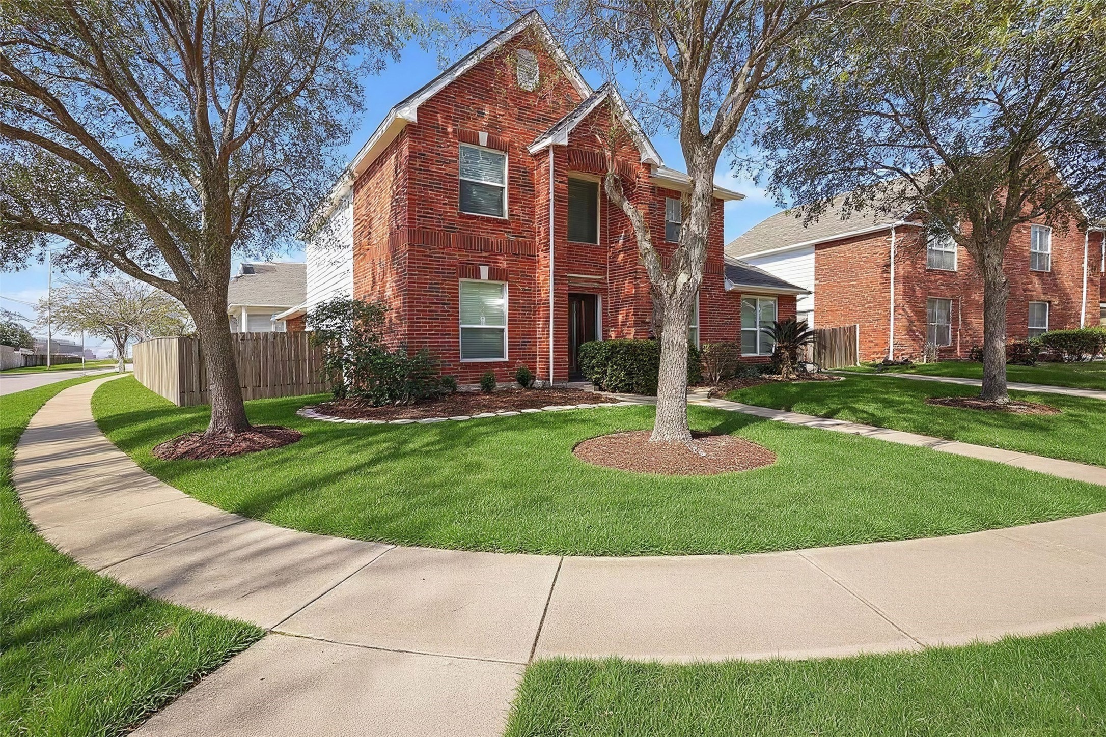 9319 Hudson Bend Circle Houston, TX 77095 - Photo 1 of 42 Virtually enhanced grass color. Spring is coming and you will see it like this.