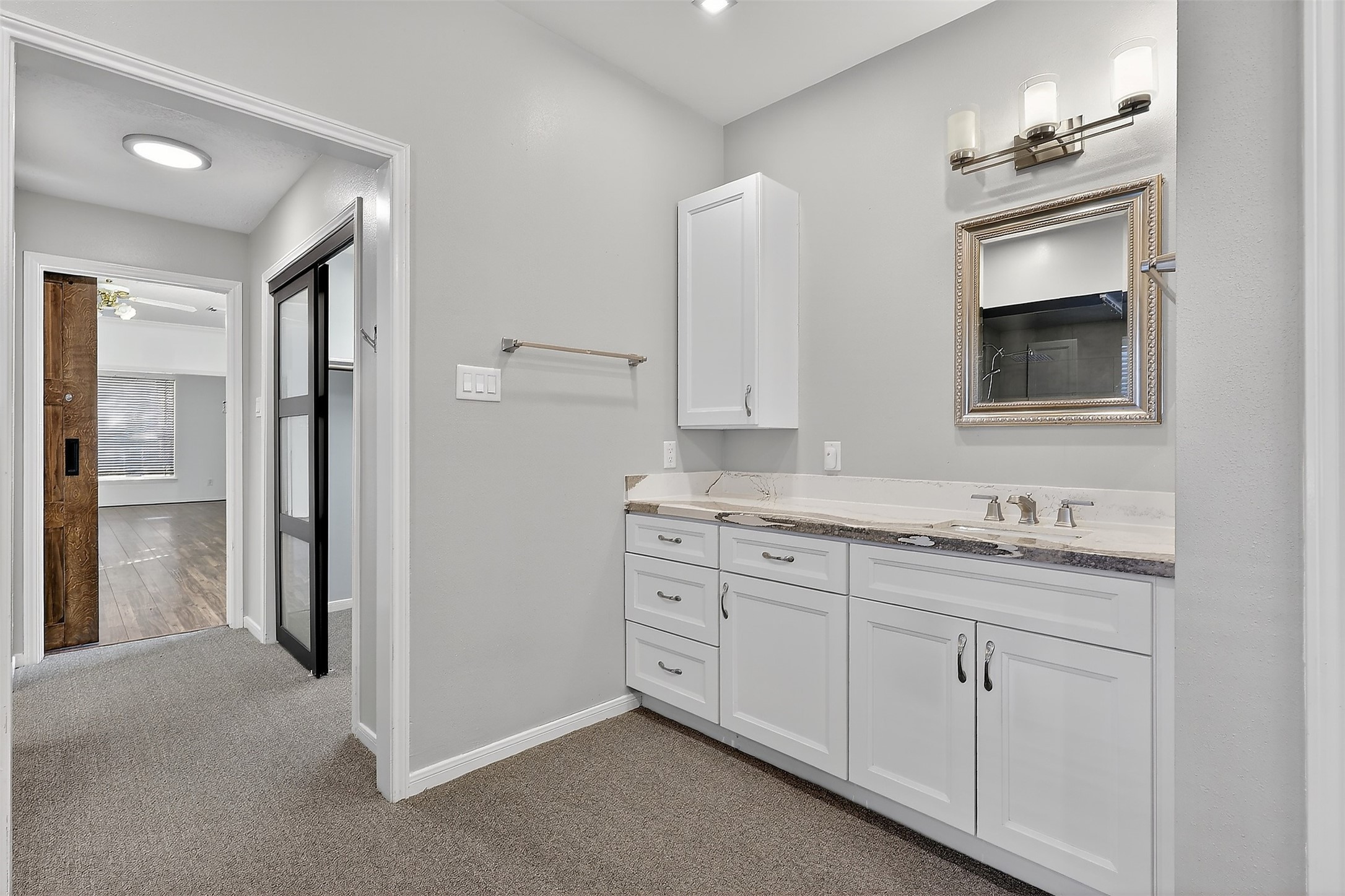 9319 Hudson Bend Circle Houston, TX 77095 - Photo 24 of 42 View of the principal bedroom from a modern spacious bathroom.