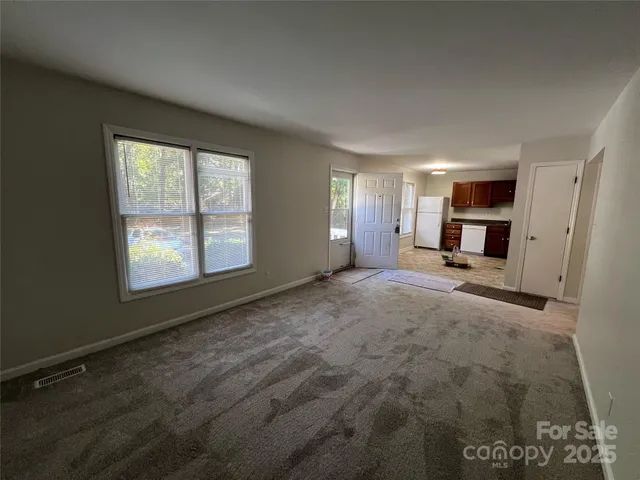 a view of a livingroom with a fireplace