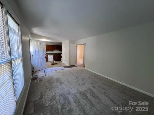 a view of a livingroom with a fireplace