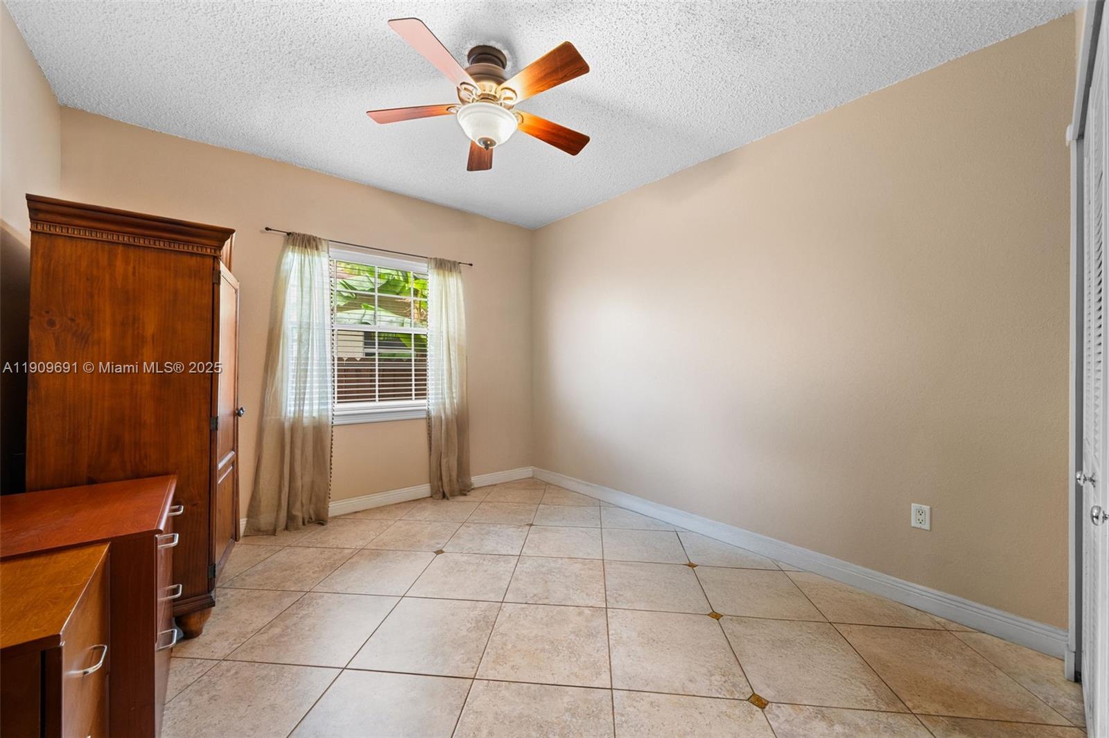 3510 Southwest 13th Street Miami, FL 33145 - Photo 18 of 30 a view of an empty room with a window