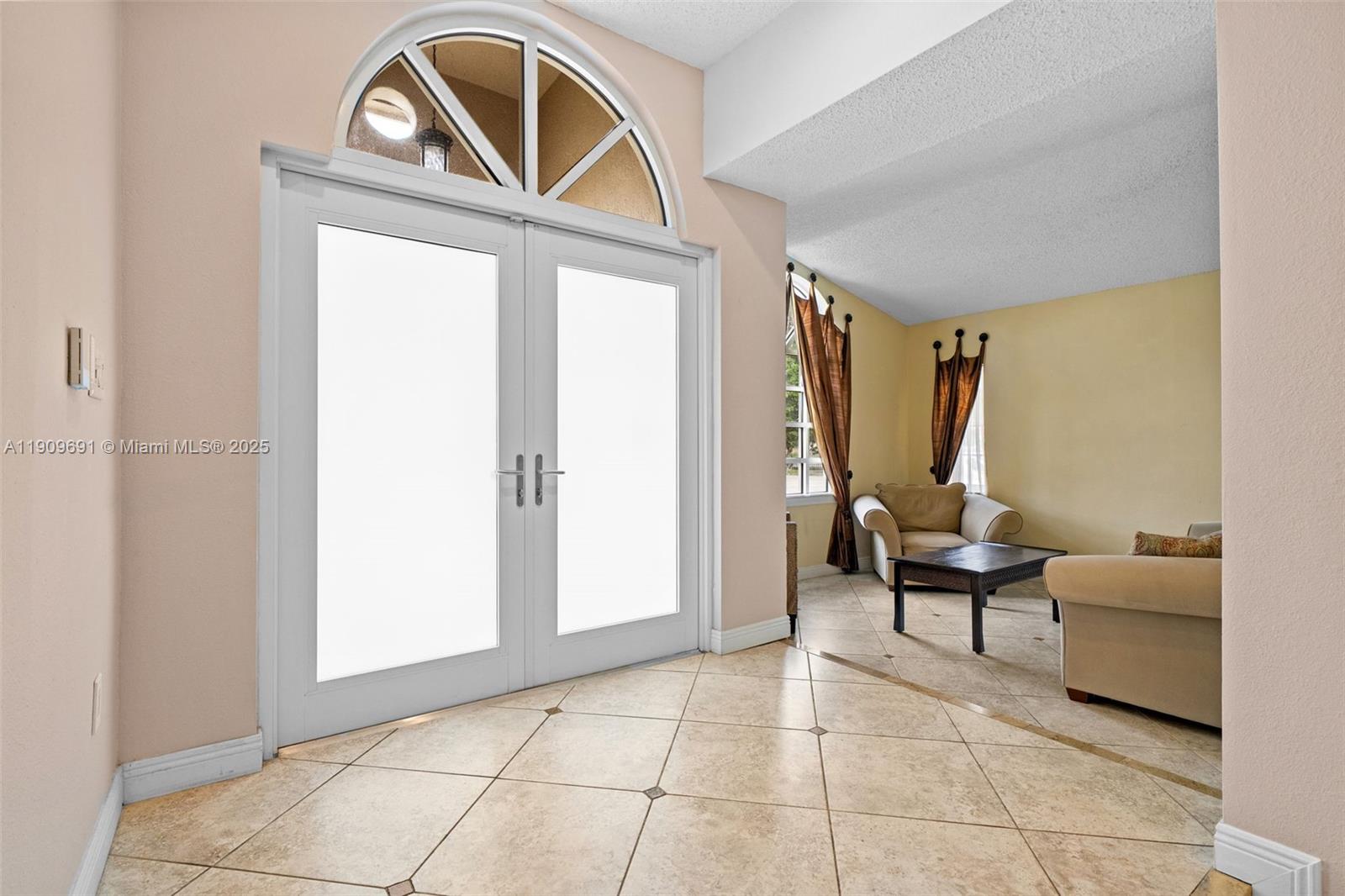 3510 Southwest 13th Street Miami, FL 33145 - Photo 3 of 30 a living room with furniture and a window