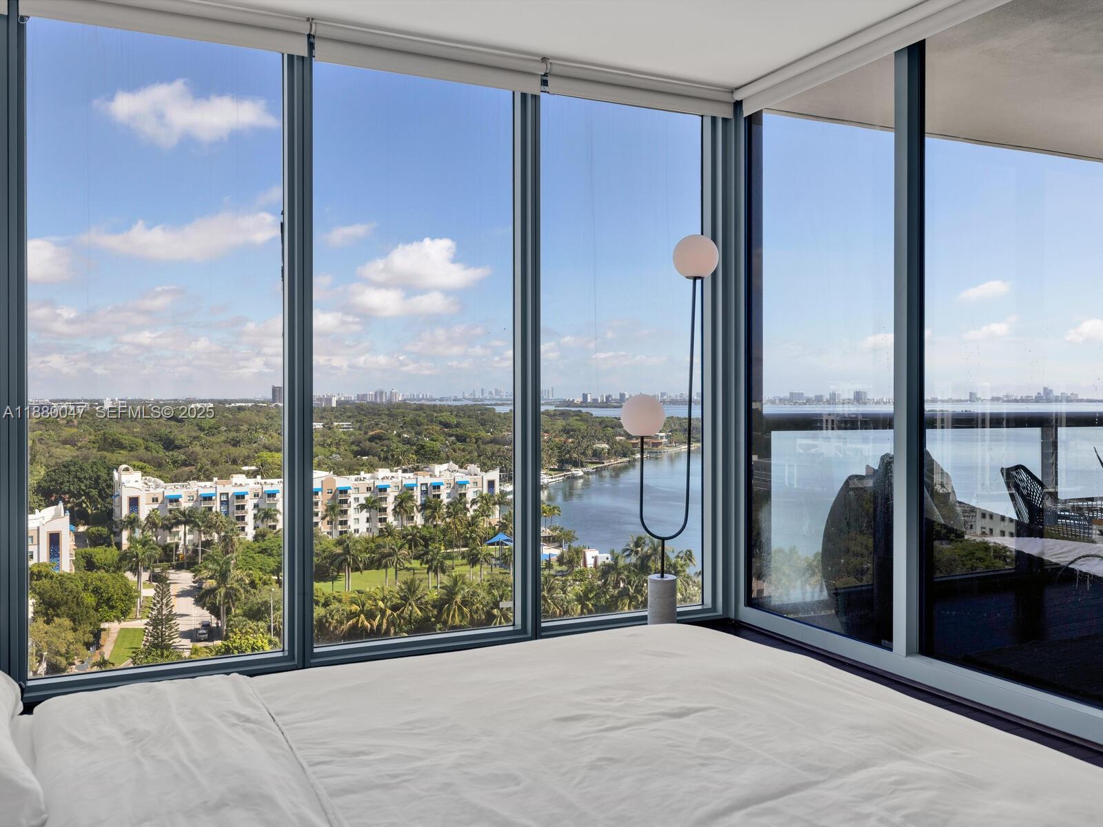 601 Northeast 36th Street, Unit 1304 Miami, FL 33137 - Photo 28 of 40 a view of a glass door with a view of living room