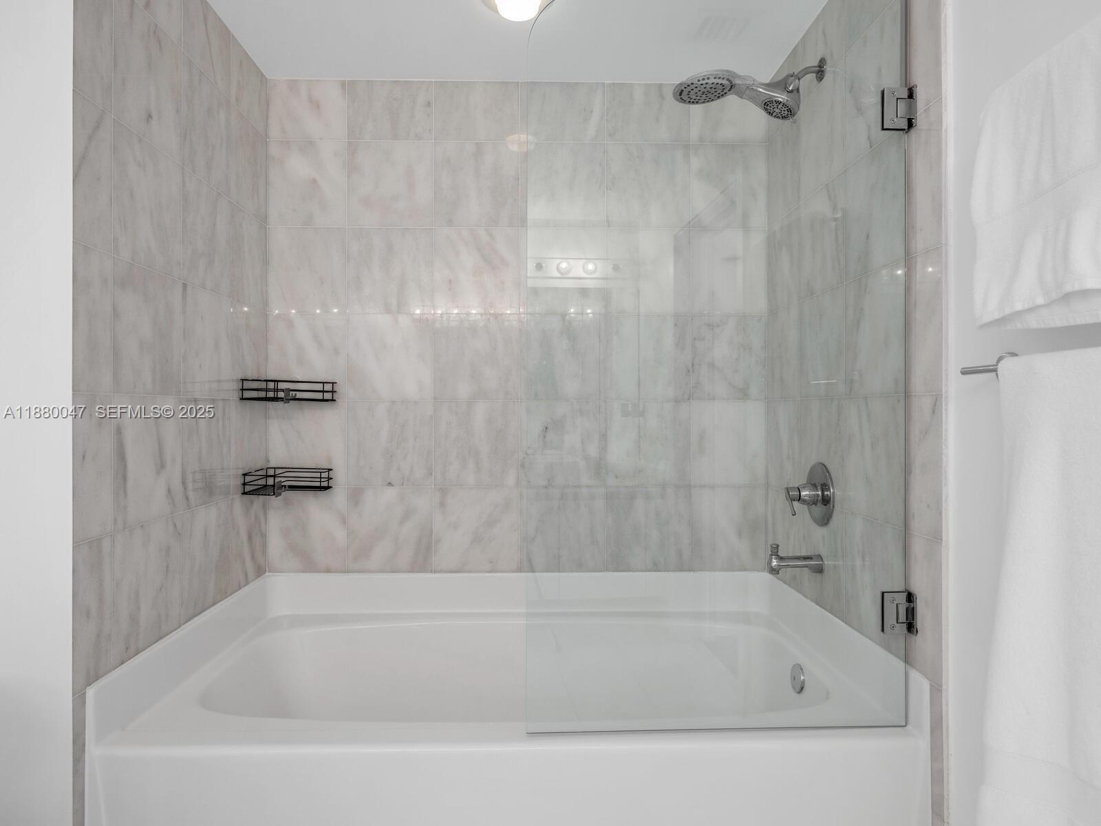 601 Northeast 36th Street, Unit 1304 Miami, FL 33137 - Photo 31 of 40 a close view of a bathtub in bathroom