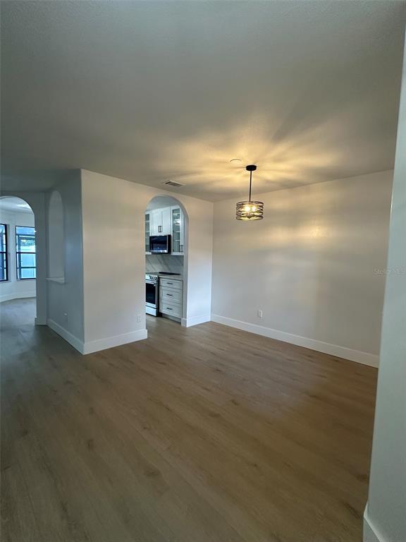 706 Lighthouse Court Altamonte Springs, FL 32714 - Photo 36 of 64 a view of empty room with wooden floor