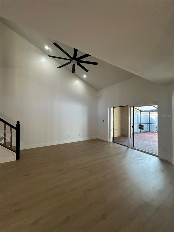 706 Lighthouse Court Altamonte Springs, FL 32714 - Photo 42 of 64 a view of an empty room with window and wooden floor