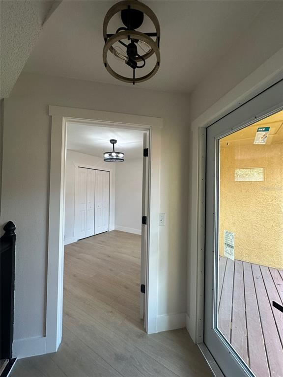 706 Lighthouse Court Altamonte Springs, FL 32714 - Photo 54 of 64 a view of a hallway with wooden floor